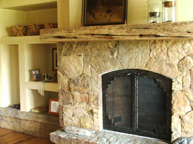 Wall-mounted fireplace inside a room